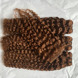 Chocolate brown human hair bundles with deep curly waves and HD transparent lace closure, featuring a wet and wavy style.