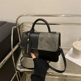 Elegant women's crossbody handbag with geometric pattern, snap closure, and shoulder strap, ideal for everyday fashion.
