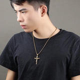 Stainless steel Jesus cross necklace for men, shown in gold and silver options