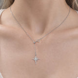 Gold stainless steel North Star pendant necklace with zircon accents, featuring an eight-pointed star design on a delicate chain.