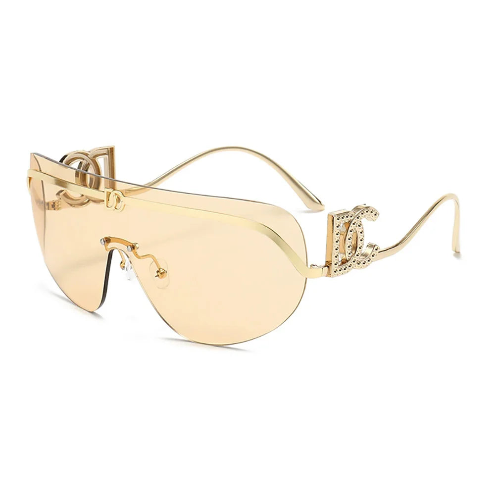 Luxury women's oversized shield rimless sunglasses with gradient lenses and UV400 protection, featuring a trendy one-piece design.