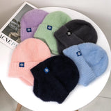 Women's candy-color faux fur knitted earflap winter hat, soft Kpop-style beanie cap in a streetwear design
