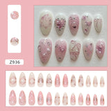 24-piece pink almond false nail patches with bowknots, love hearts, and pearl designs by HSF Marketplace