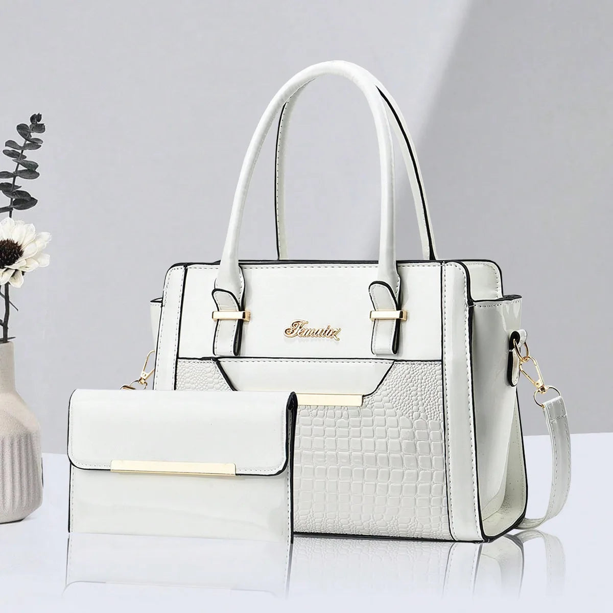 High-quality black PU leather messenger bag for women, luxury designer shoulder crossbody purse with stylish accents.