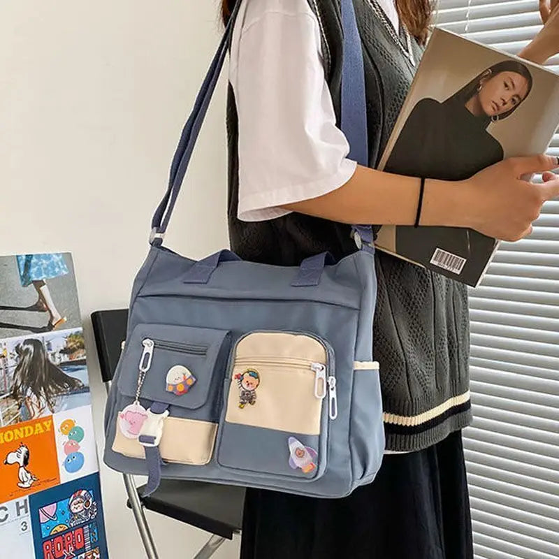 Waterproof canvas women's handbag with shoulder strap, nylon tote, and crossbody style, featuring Oxford design for girls.