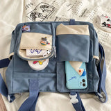 Waterproof canvas women's shoulder handbag by HSF Marketplace, nylon tote with crossbody strap and satchel style for girls.