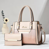 High-quality black PU leather messenger handbag for women with shoulder strap, crossbody style, designer look, and spacious purse.