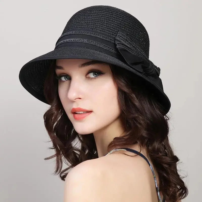 Muchique women's summer straw boater hat with wide brim and casual bow for beach travel