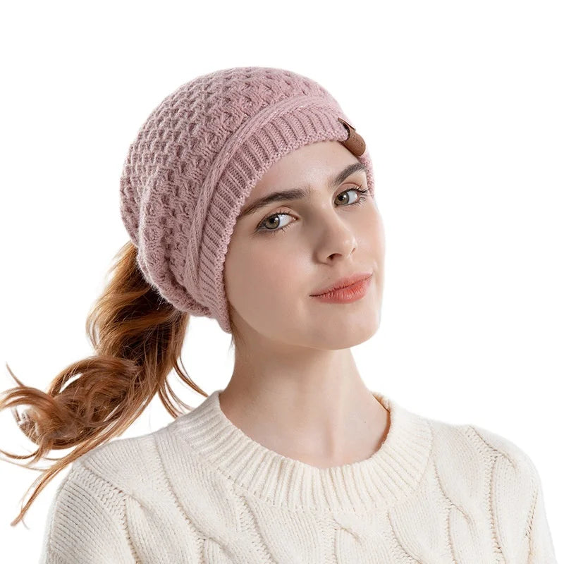 Women's HSF beanie with ponytail hole, ear flaps, fleece lining, and slouchy winter cap design