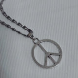 Hippie peace sign necklace in stainless steel for women, featuring a classic peace symbol pendant