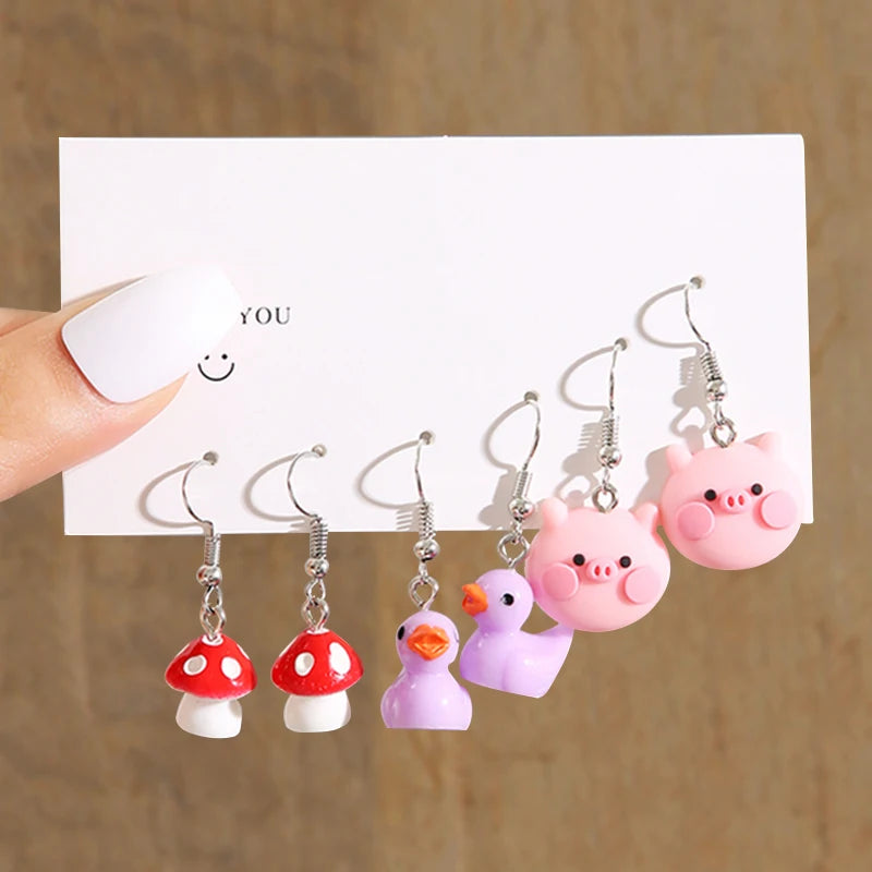 Cute cartoon duck dangle earrings set in yellow and white, trendy girls' jewelry by HSF Marketplace