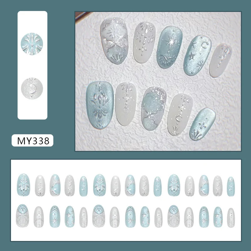 24-piece Y2K star press-on false nails with gradient blue French tips and gold moon designs, almond shape