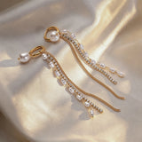 Gold color long tassel dangle earrings for women by HSF Marketplace, featuring a layered tassel design