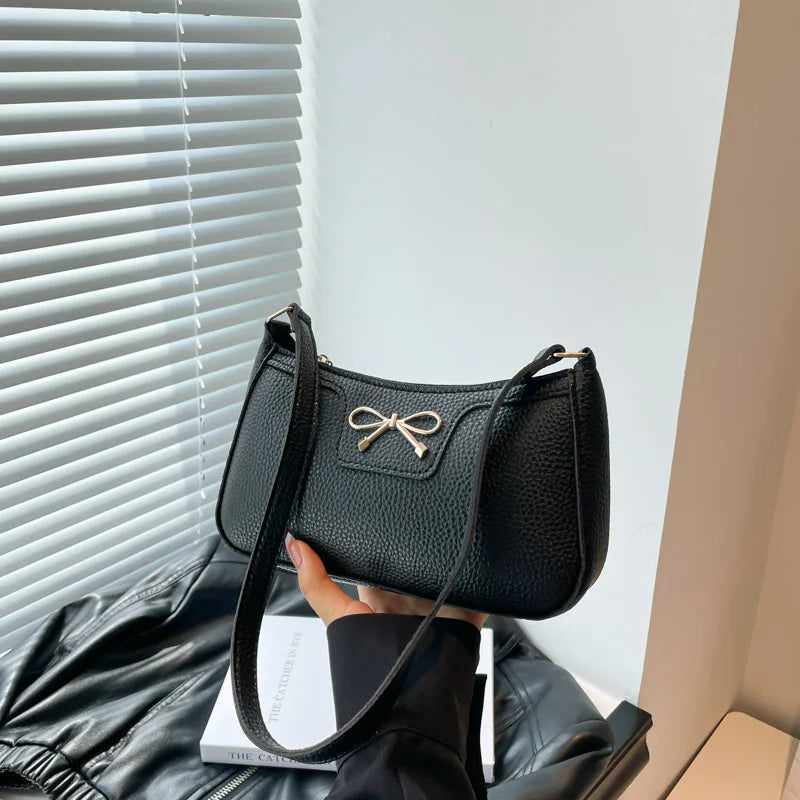 Ladies bow design underarm shoulder handbag by HSF Marketplace, stylish and fashionable commute purse with personality.