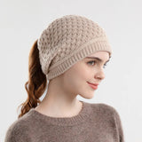 Women's HSF Marketplace beanie with ponytail hole, ear flaps, fleece lining, and slouchy winter design