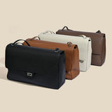Luxury genuine leather women's shoulder bag for winter fashion, black handbag with adjustable strap