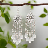Bohemian HSF Marketplace water drop tassel earrings for women, vintage dangle jewelry in detailed close-up