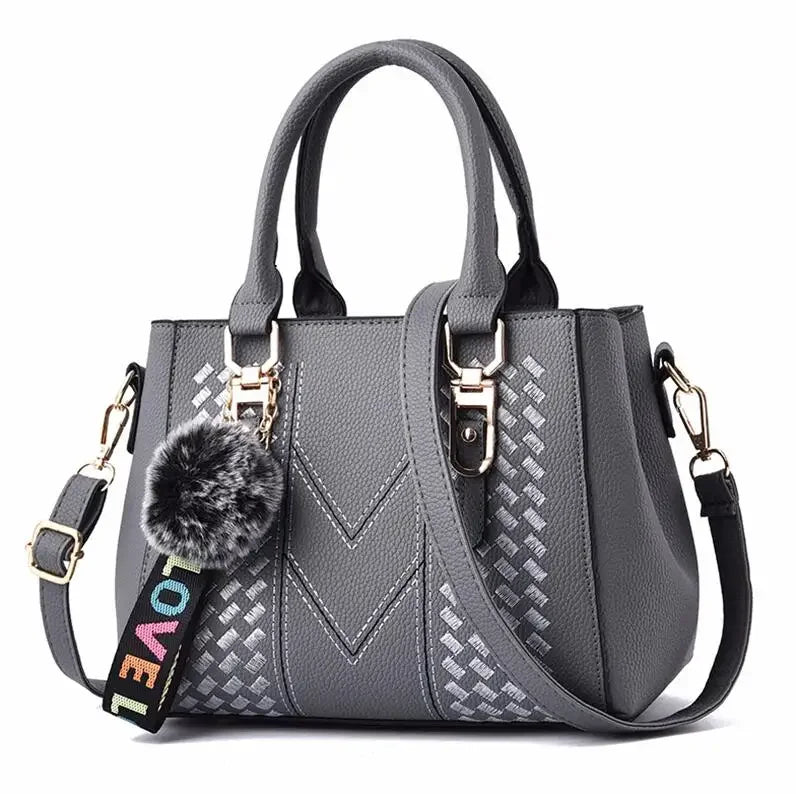 Leather embroidery messenger bag for women, featuring a hairball design, stylish handbag perfect for daily use.