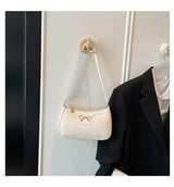 Ladies bow design underarm shoulder handbag featuring a fashionable and personality-driven style, ideal for commuting.
