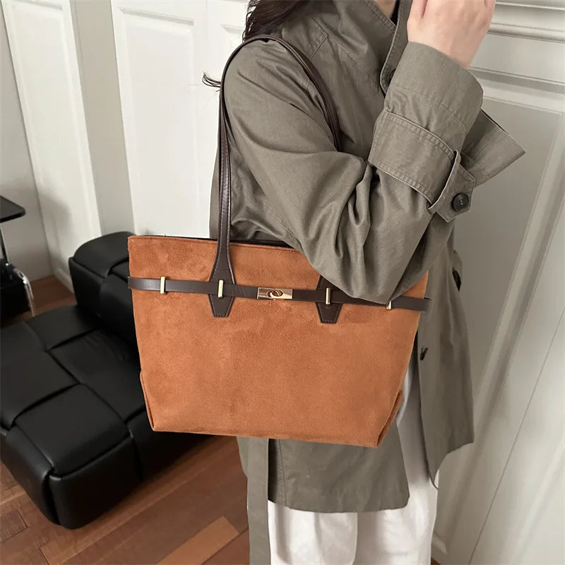 Leopard print shoulder tote bag with brown faux leather trim and gold lock detail, spacious handbag for women’s daily use.