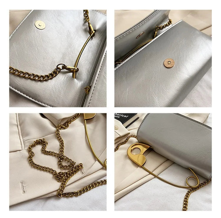 Red retro metal pin design women’s crossbody handbag made of PU leather with chain strap and clutch style from HSF Marketplace.
