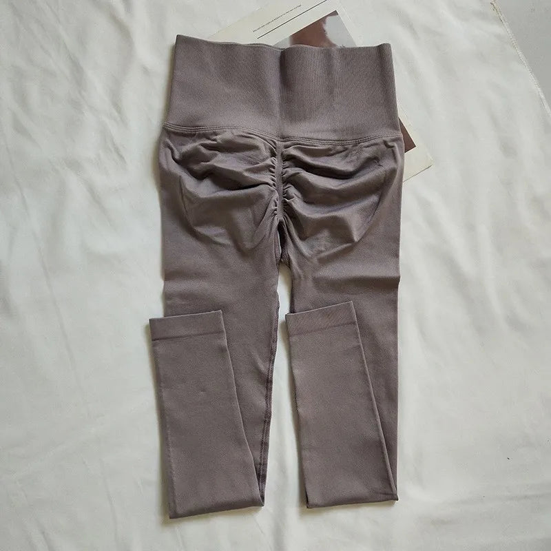 Women's high-waisted seamless leggings by HSF Marketplace with elastic waistband and peach butt-lifting fit
