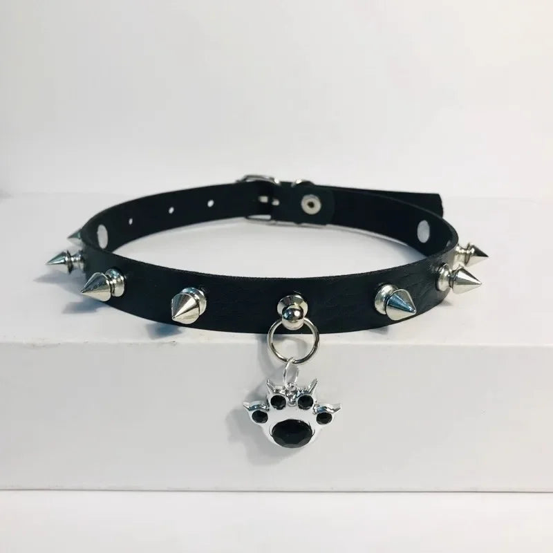 Gothic cat claw choker necklace featuring paw pendant, PU leather, rivets, and charms, ideal for women’s fashion jewelry.