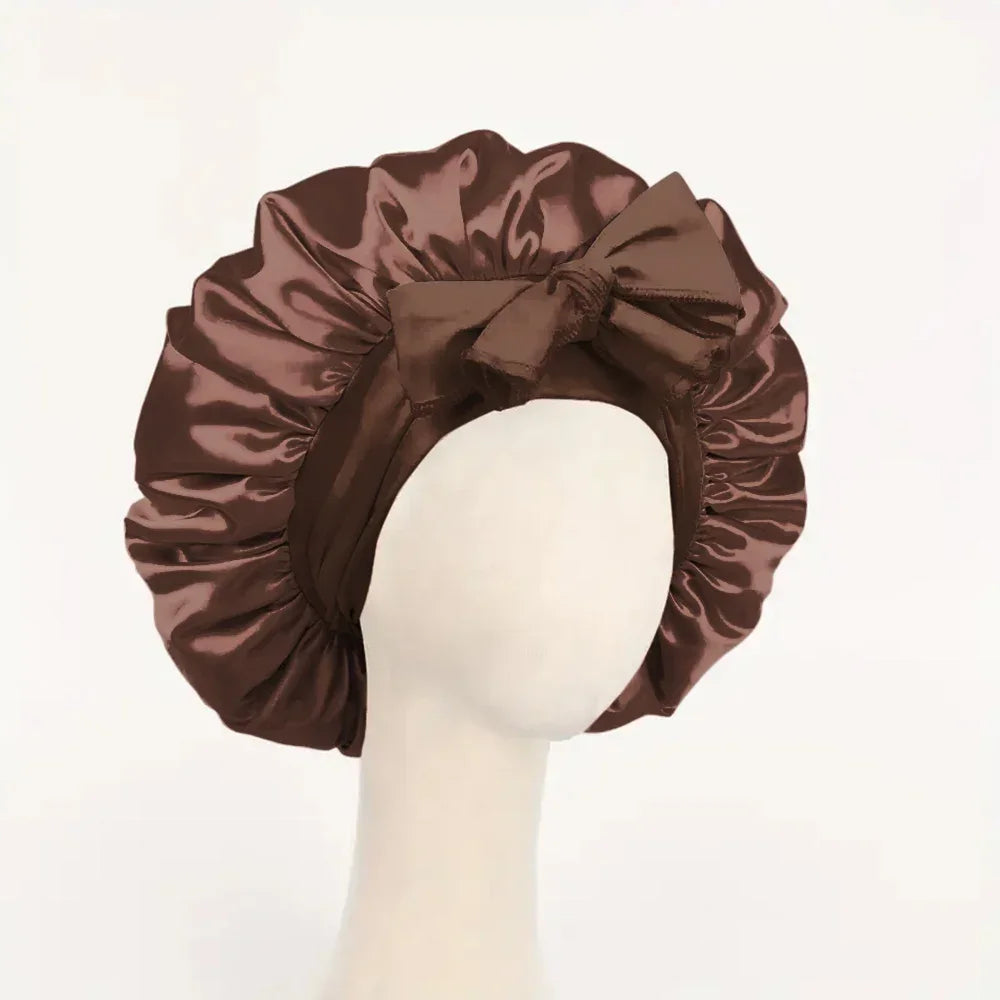 Silk satin adjustable sleep bonnet with tie band, suitable for women and men, designed for hair protection during sleep.