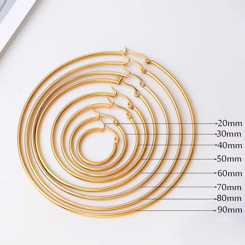 Classic stainless steel hoop earrings for women, available in 30–80mm sizes
