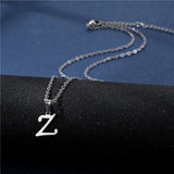 Simple stainless steel initial letter pendant necklace for women, featuring a glossy chain choker and elegant jewelry design.