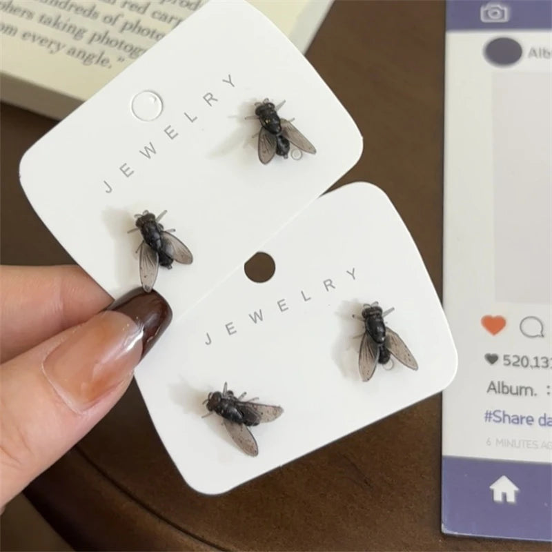 Realistic fly stud earrings for women, small black insect design by HSF Marketplace