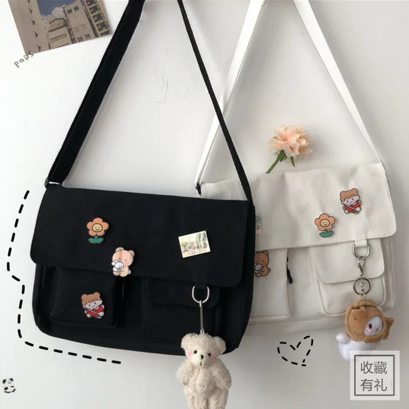 Women’s casual canvas messenger bag by HSF Marketplace, featuring printed design, shoulder strap, and compact crossbody style.