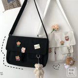 Women’s casual canvas messenger bag by HSF Marketplace, featuring printed design, shoulder strap, and compact crossbody style.