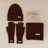 Women's knitted winter hat, scarf, and glove set in a warm autumn design by HSF Marketplace