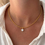 Gold-plated stainless steel choker necklace with cubic zirconia accents, waterproof jewelry for women, ideal for daily wear and parties.