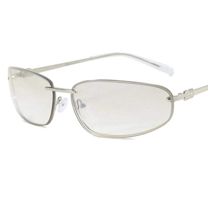 Oval frameless Y2K punk sunglasses with luxury high-end styling for women, shown in retro outdoor fashion design