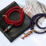 Red and blue beaded necklace with natural stones, stainless steel fish pendant, multi-layered jewelry by HSF Marketplace