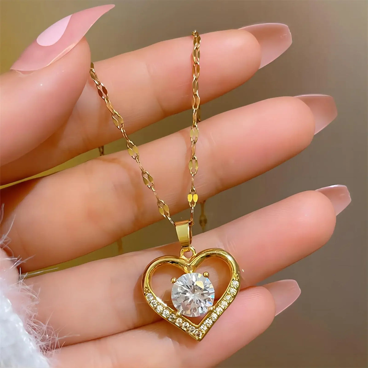 Trendy gold heart stainless steel zirconia necklace for women and girls, ideal for parties, birthdays, or daily jewelry wear.