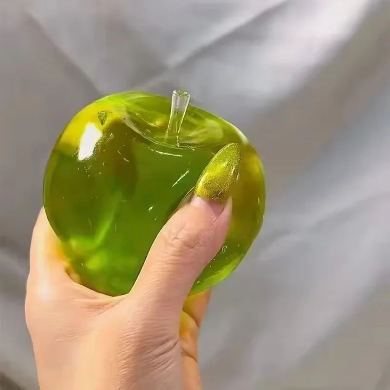 Green apple squeeze toy by HSF Marketplace for stress relief and relaxation