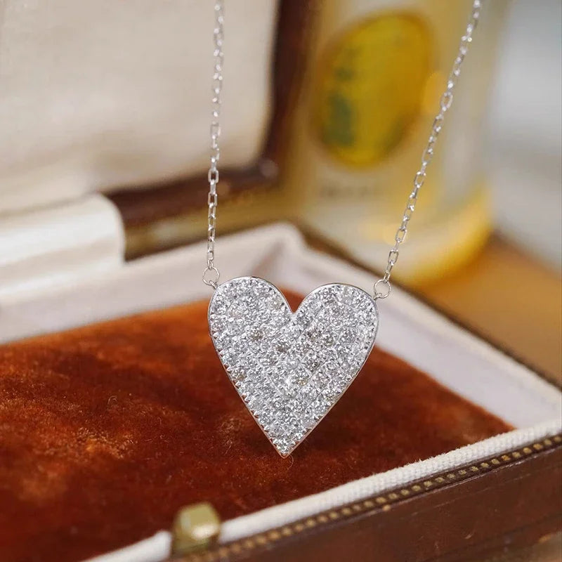 Huitan heart pendant necklace with sparkling CZ stones for women, delicate jewelry design