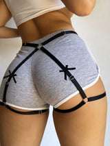 Lady's gothic punk black elastic harness belt with adjustable waist and thigh straps for festival party wear
