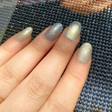 24-piece Y2K star press-on false nails with gradient blue French tips and gold moon designs, almond shape