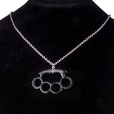 Resin imitation four-finger boxing glove joint pendant necklace with metal chain, fashionable jewelry for women.