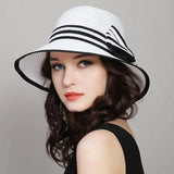 Muchique women's boater straw hat with wide brim and casual bow for summer beach travel