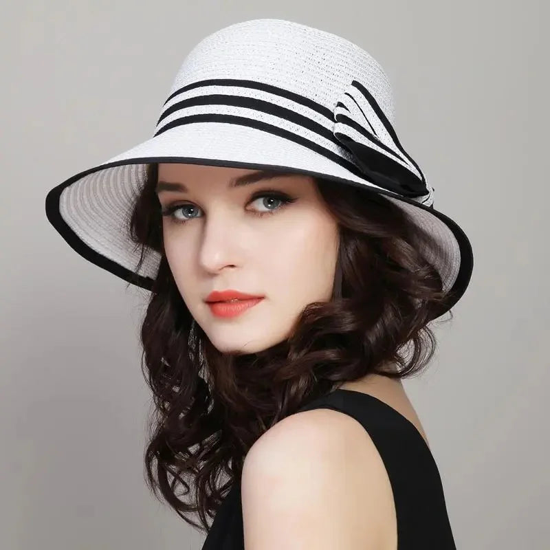 Muchique women's boater straw hat with wide brim and casual bow for summer beach travel