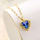 Heart-shaped stainless steel necklace with zirconia accents, gold color jewelry for women and girls, perfect for parties and daily wear.