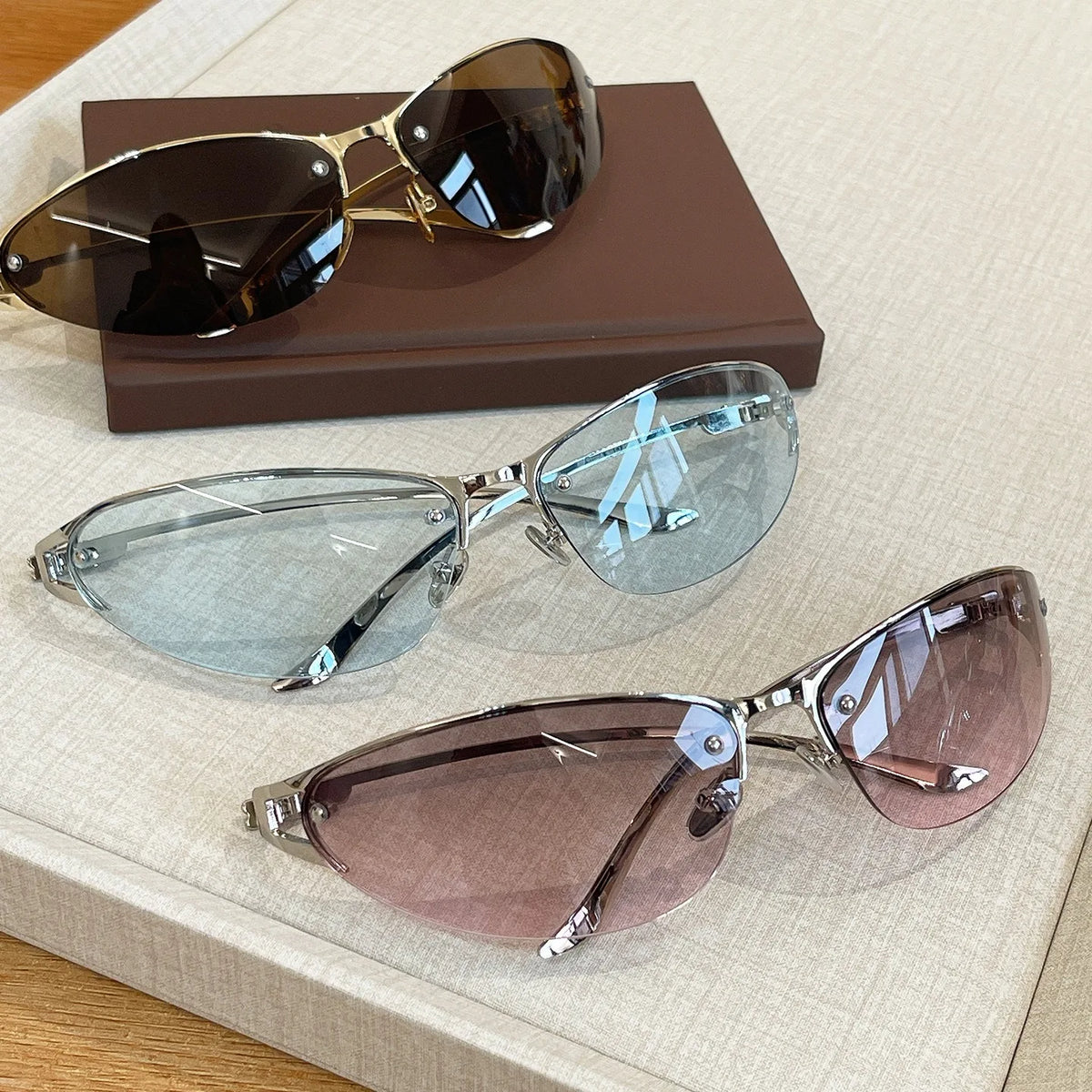 Harajuku half-frame cat eye sunglasses for women with gradient lenses and metal frames