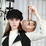 HIFASHION small genuine leather evening bag with top handle, round shape, elegant design, perfect for parties and special occasions.