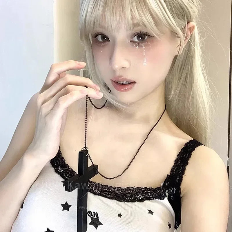 Black and white gothic wood cross pendant necklace for women, Y2K hip hop style choker jewelry with sweater chain design.
