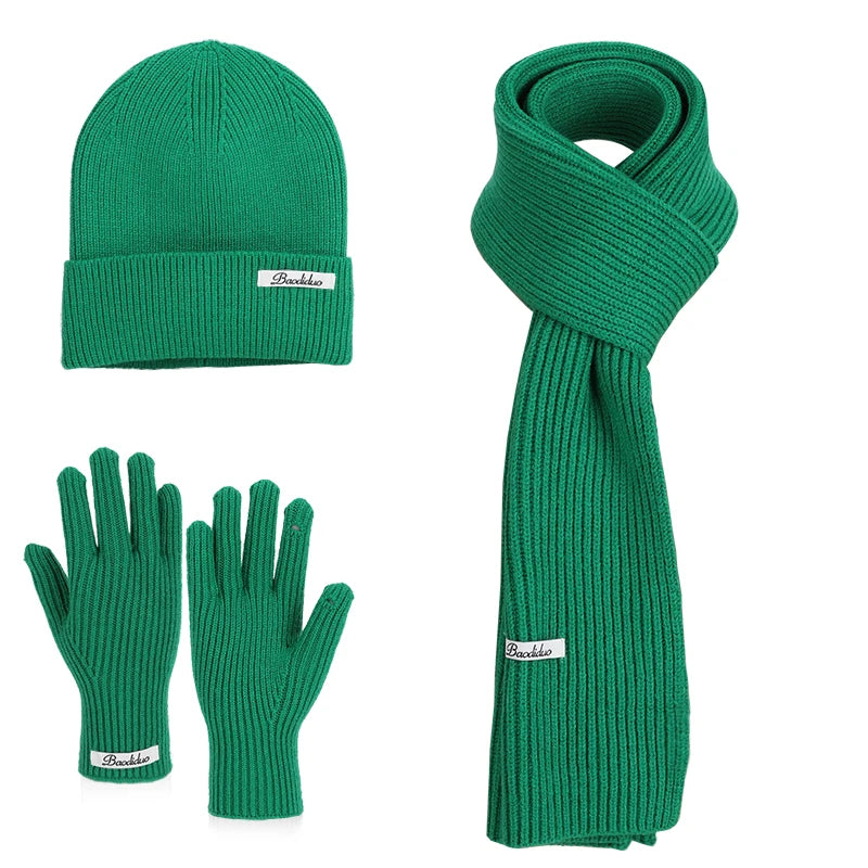 Warm knitted wool hat, gloves and scarf set in winter colors for cold weather protection